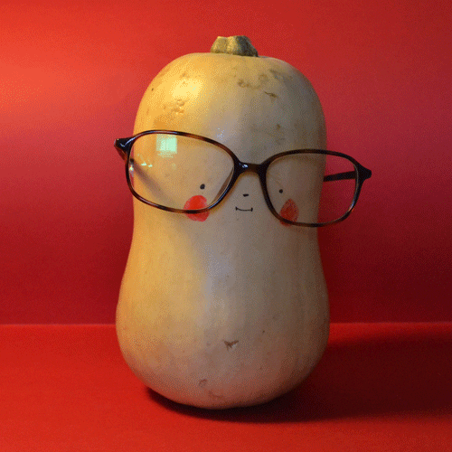 A butternut squash wearing glasses has a good look around